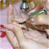 Best Nails - Apply CrystaLac gel polish nr. 55 to the nail.